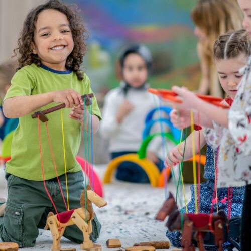 kids playing with puppets